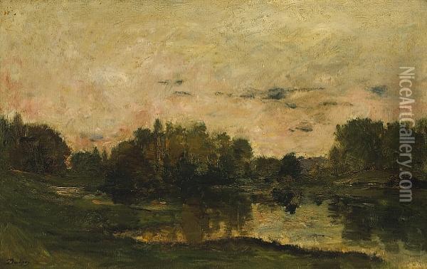 An Extensive Landscape At Sunset With A Lake In The Foreground Oil Painting - Karl Pierre Daubigny