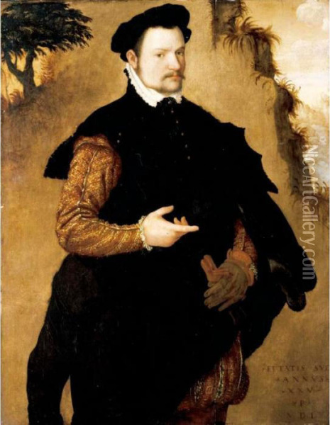 Portrait Of A Gentleman, 
Three-quarter Length, Wearing An Elaborately Embroidered Doublet And A 
Fur-trimmed Black Cape Oil Painting - Lambert Sustris
