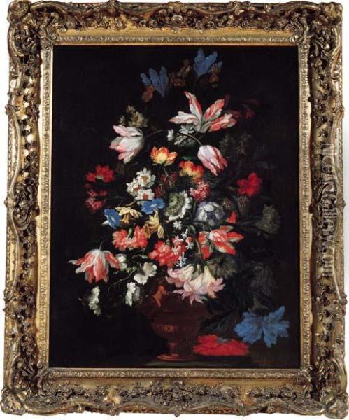 Tulips, Carnations, Chrysanthemums And Other Flowers In A Sculpted Vase On A Stone Ledge Oil Painting - Mario Nuzzi Mario Dei Fiori