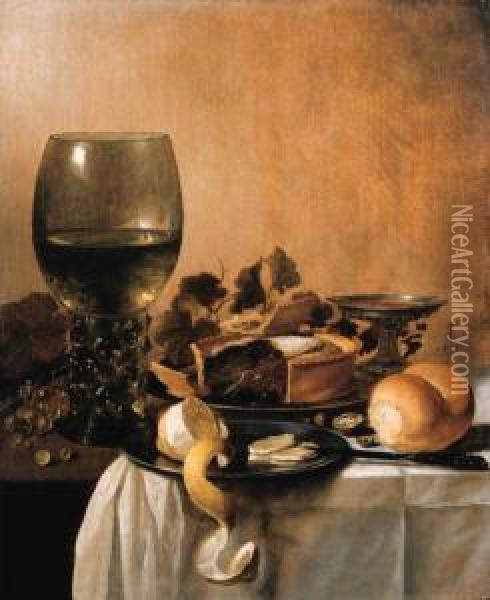 A Giant Roemer, A Silver Tazza, A
 Pie And A Partly Peeled Lemon On Pewter Plates, Grapes On The Vine, A 
Bread Roll And A Knife On A Partially Draped Table Oil Painting - Pieter Claesz.