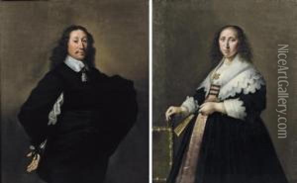 Portrait Of A Gentleman, 
Three-quarter-length, In A Black Costume With A White Chemise And 
Collar; And Portrait Of A Lady, Three-quarter-length, In A Pink 
Embroidered Dress And Black Coat With White Cuffs And Collar Standing By
 A Chair Holding A F Oil Painting - Hendrick Gerritsz. Pot