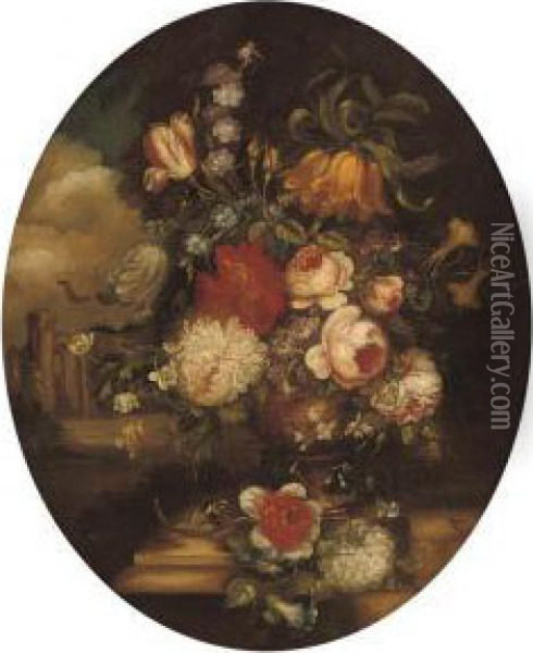 Roses, Camelias, Tulips And 
Other Flowers In An Urn, On A Stoneledge, A Classical Building Beyond Oil Painting - Giuseppe Lavagna
