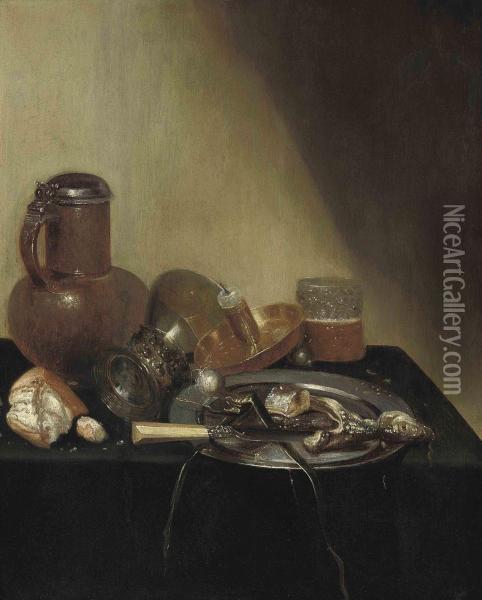 A 'pronk' Still Life, With A Herring On A Pewter Plate, Anearthenware Jug, A Loaf Of Bread, An Upturned Roemer, A Candleholder, And A Beer Glass On A Draped Table Oil Painting - Willem Claesz. Heda
