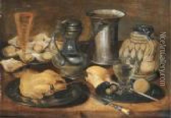 A Roast Pheasant, A Roemer, 
Olives, A Lemon And A Pipe, And Oysterson Pewter Plates, With A Pewter 
Pitcher, A Facon-de-venisewineglass, A Knife, A Roll Of Bread, A Tankard
 And A Flask On Awooden Table Oil Painting - Georg Flegel