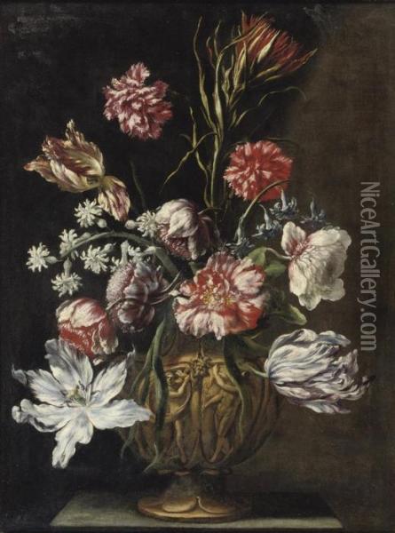 Tulips, Marigolds And Other Flowers In A Sculpted Vase On A Stone Ledge Oil Painting - Mario Nuzzi Mario Dei Fiori