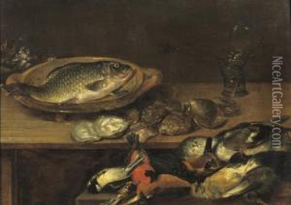 A Fish, Oysters And Songbirds On A Wooden Table Oil Painting - Alexander Adriaenssen