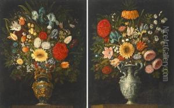 A Still Life Of Roses, Tulips, 
Lilies, Irises And Other Flowers In A Silver Urn; A Still Life Of Roses,
 Irises, Tulips And Other Flowers In A Bronze And Gilt Urn (a Pair) Oil Painting - Juan Van Der Hamen Y Leon