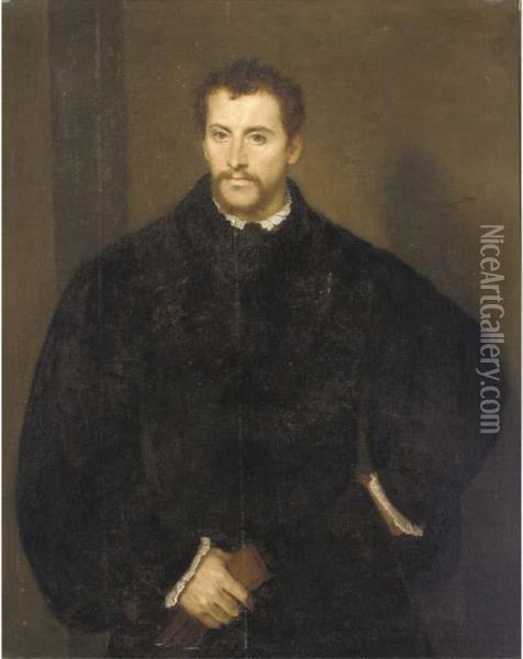 Portrait Of A Gentleman, 
Half-length, In A Black Doublet, A Pair Of Gloves In His Right Hand Oil Painting - Tiziano Vecellio (Titian)
