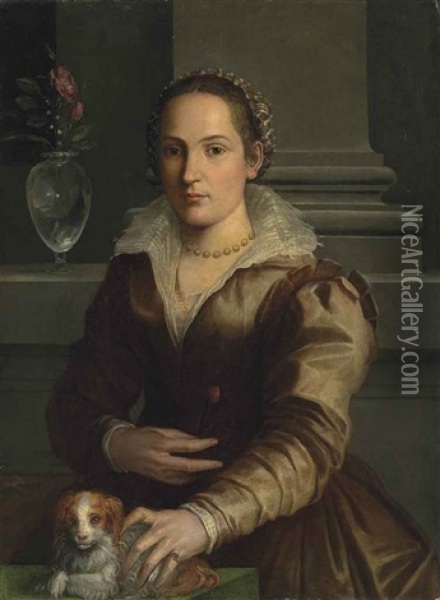 Portrait Of A Lady, Half-length, In A Rust Dress And An Elaborate Headdress, A Rose In Her Right Hand, With A Dog, Beside A Vase With Roses And Snowdrops, In An Interior Oil Painting - Alessandro di Cristofano Allori