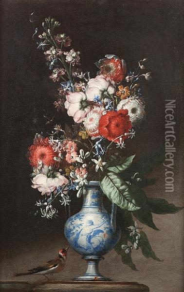 Chrysanthemums, Roses, Bluebells
 And Other Flowers In A Blue And White Vase On A Stone Ledge With A 
Greenfinch Nearby Oil Painting - Nicola Malinconico