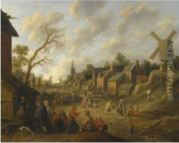 A Wide Street Through A Village Filled With Numerous Figures Andoverlooked By A Windmill Oil Painting - Joost Cornelisz. Droochsloot