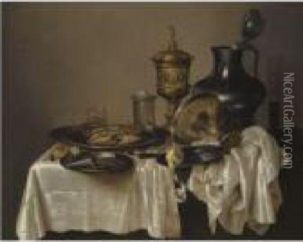 A Monochrome Still Life With A 
Silver-gilt Goblet, An Overturnedsilver Tazza, A Pewter Flagon, Glasses 
And A Salt Cellar, With Acrab, Oysters, Nuts, A Knife And A Peeled Lemon
 On A Table Drapedwith A White Cloth Oil Painting - Willem Claesz. Heda