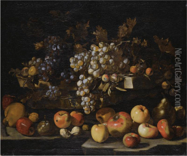 A Still Life With Red And Green Grapes, Apples, Pears, Hazelnuts, Figs, Walnuts And Plums Over A Stone Ledge Oil Painting - Luca Forte