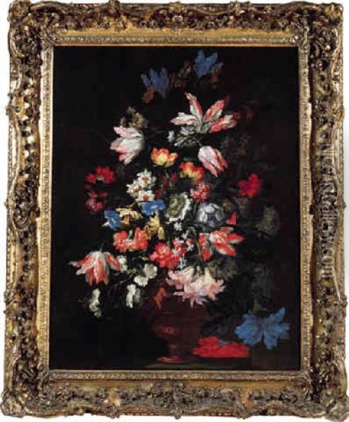 Tulips, Carnations, Chrysanthemums And Other Flowers In A Sculpted Vase On A Stone Ledge Oil Painting - Mario Nuzzi