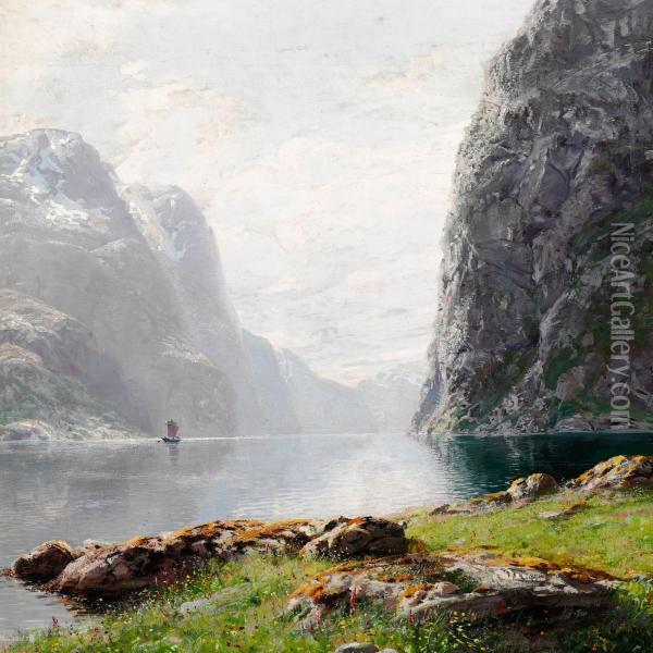 View Of A Norwegian Fiord With A Sailing Ship Between Tall Vertical Cliffs Oil Painting - Hans Dahl