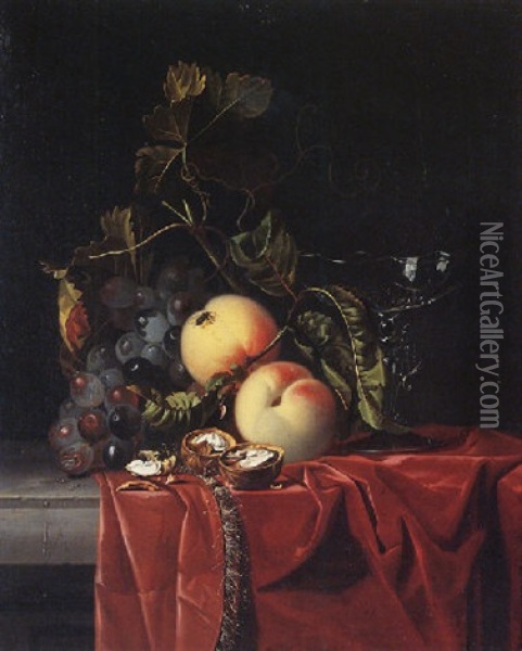 A Still Life Of Grapes, Peaches, Walnuts And A Wine Glass Upon A Ledge Draped With A Red Cloth Oil Painting - Isaac Denies