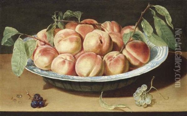 Peaches In A Chinese Blue And White Porcelain Bowl With Black And White Grapes, On A Wooden Table Oil Painting - Rene Nourisson