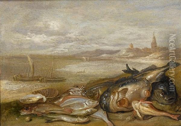 A Still Life Of Various Fish And
 Crustacea Ona Beach, With Fishing Boats And A Town Beyond Oil Painting - Jan van Kessel