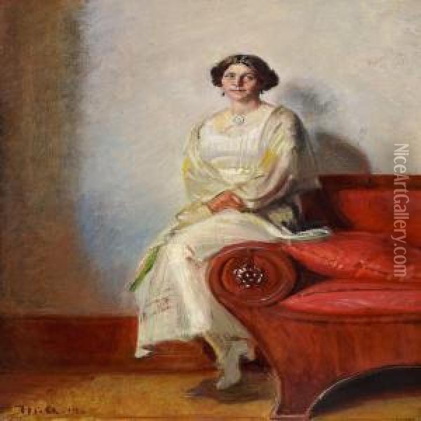 Portrait Of Henny Brodersen Seated On A Sofa Armrest Oil Painting - Michael Ancher