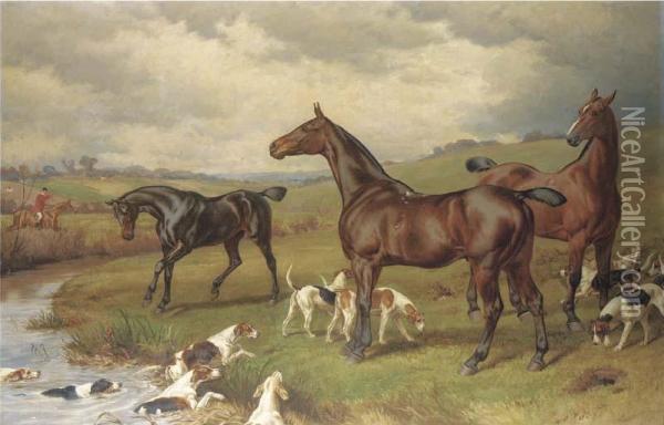 A Hunting Scene, With Horses And Hounds In The Foreground, And A Hunt Beyond Oil Painting - William H. Hopkins
