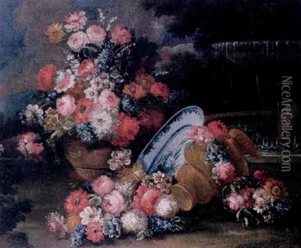 A Still Life Of A Vase Of Flowers Beside An Upturned Vase And An Oriental Dish Before A Fountain In A Landscape Oil Painting - Giuseppe Lavagna