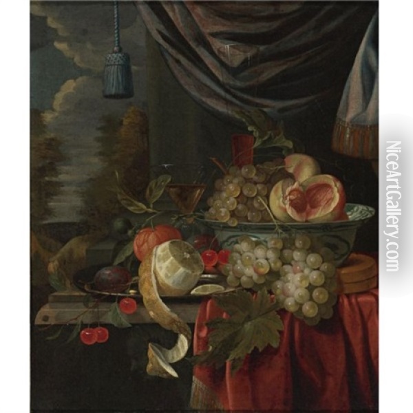 Still Life Of Grapes And Peaches In A Blue And White Porcelain Bowl, A Peeled Lemon, Plums And Cherries On A Pewter Plate, With Glasses And Other Fruit On A Draped Table, A Landscape Beyond Oil Painting - Gillis Jacobz van Hulsdonck