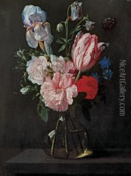A Tulip, Roses, Iris And Other Flowers In A Glass Vase On Aledge Oil Painting - Nicolas Van Veerendael