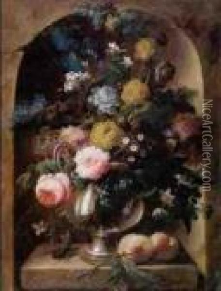 Still Life Of Roses, An Iris, 
Lilacs, Narcissi, Primroses And Other Flowers In A Glass Vase Resting On
 A Stone Ledge With Peaches And A Beetle, Within A Niche Oil Painting - Johann Baptist Drechsler
