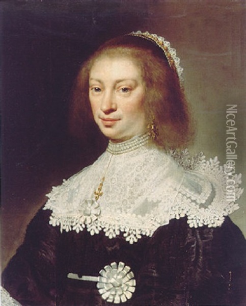 Portrait Of A Lady Wearing An Embroidered Black Dress, A Lace Collar, A Pearl Necklace And A Lace And Jewelled Headdress Oil Painting - Jan Anthonisz Van Ravesteyn