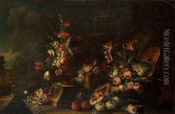 Carnations, Tulips, Peonies And 
Other Flowers In An Urn With Other Flowers , A Melon, Pomegranates And A
 Blue And White Pottery Vase Before A Fountain In A Landscape Oil Painting - Giuseppe Lavagna