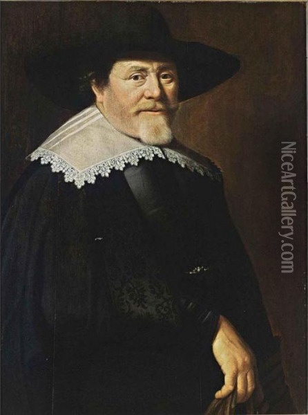 A Portrait Of A Bearded 
Gentleman, Half Length, Wearing A Black Suit, A Black Hat And A White 
Lace Collar, Holding Gloves In His Right Hand Oil Painting - Claes Cornelisz Moeyaert