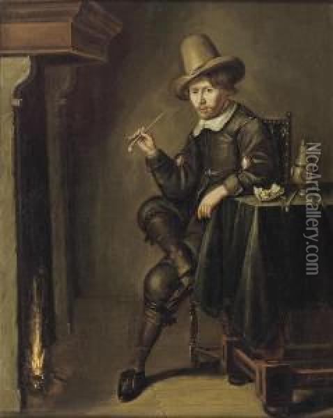 A Young Man Smoking A Pipe Near A Fireplace Oil Painting - Pieter Codde