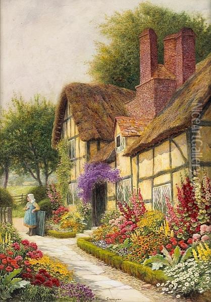 A Cottage Garden In Full Bloom With A Young Girl Standing By A Gate Oil Painting - Arthur Claude Strachan