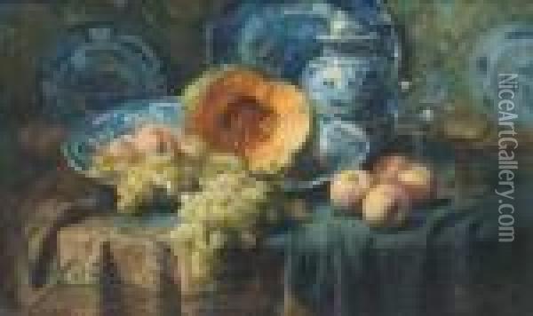 A Pumpkin, Peaches, And Grapes In A China Bowl By Glasses On Adraped Table Oil Painting - Frans Mortelmans