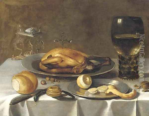 A roemer of wine, a turkey and a partly-peeled lemon on pewter dishes, bread and hazelnuts on a draped table Oil Painting - Pieter Claesz