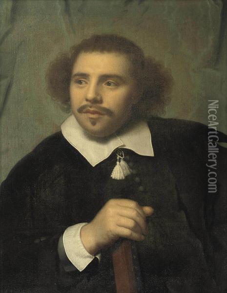 Portrait Of A Man, Half-length, In A Black Costume With A White Collar And Cuffs Oil Painting - Isaac Luttichuys