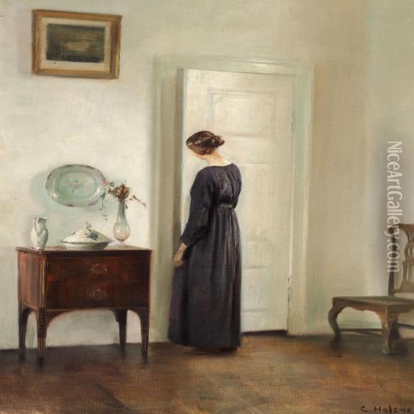 Interior With A Woman Inblack Opening A White Painted Door Oil Painting - Carl Vilhelm Holsoe