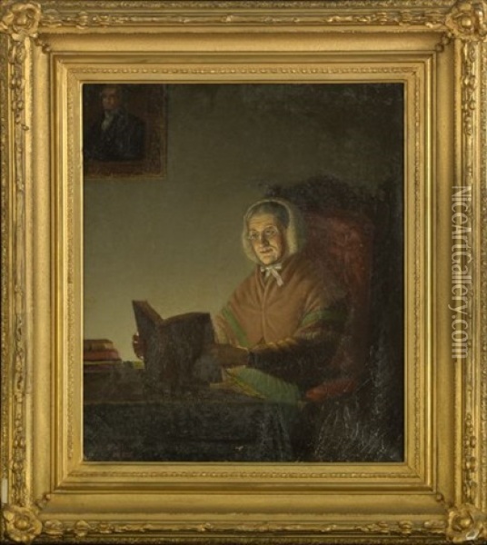 Elderly Woman Seated At A Desk Reading A Book By Candlelight Oil Painting - James L. Dick