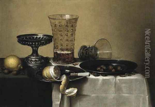 A peeled lemon, a knife and hazel-nuts on pewter plates Oil Painting - Willem Claesz. Heda