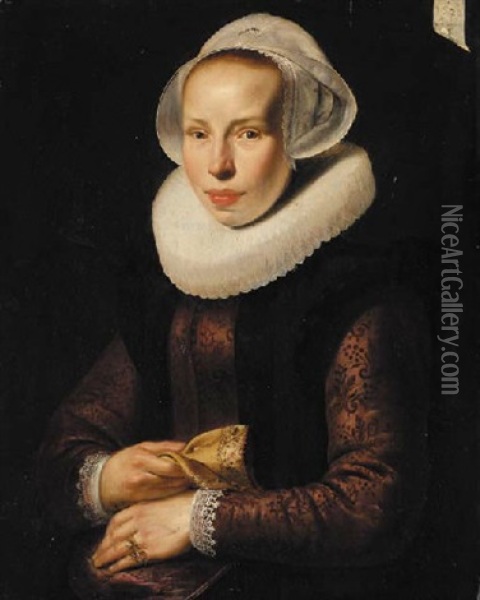 Portrait Of A Lady In An Embroidered Burgundy Bodice, With A White Ruff And White Cap, A Glove In Her Right Hand Oil Painting - Werner van den Valckert