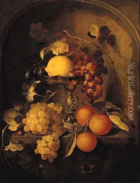 A lemon, grapes and plums on a tazza, with oranges, grapes and a hazelnut with a snail and a butterfly at a feigned sculpted stone niche Oil Painting - Laurens Craen