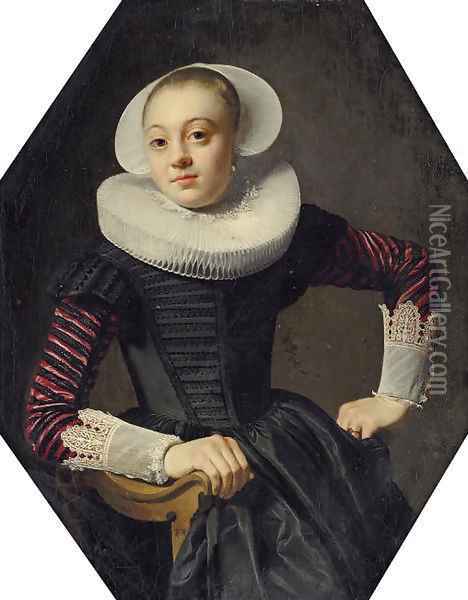 Portrait of a lady, seated three-quarter-length, in a black dress with red slashed sleeves, lace cuffs and a ruff Oil Painting - Thomas De Keyser