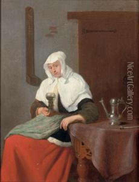 A Woman Seated At A Table, Holding A 'roemer' Oil Painting - Quiringh Gerritsz. van Brekelenkam