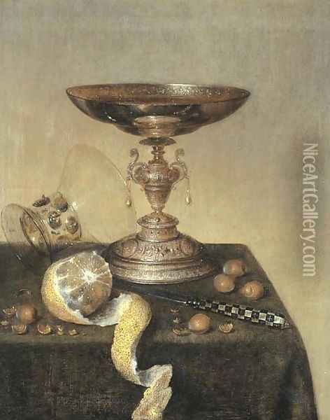 A silver tazza, an upturned roemer, a partly-peeled lemon, a knife and hazelnuts on a draped table Oil Painting - Maerten Boelema De Stomme