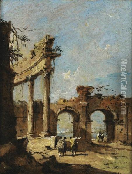 A Capriccio Of A Ruined 
Corinthian Colonnade And A Double-arched Gateway With Gentlemen 
Conversing In The Foreground Oil Painting - Francesco Guardi