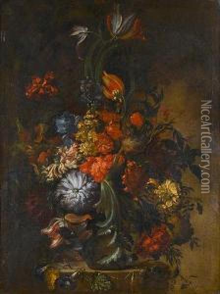 Tulips, Chrysanthemums, An Iris And Otherflowers In A Glass Vase On A Stone Ledge Oil Painting - Paolo Porpora