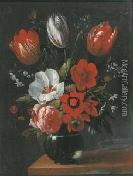 Tulips, Roses And Other Flowers In A Glass Vase On A Wooden Ledge Oil Painting - Nicolas Van Veerendael