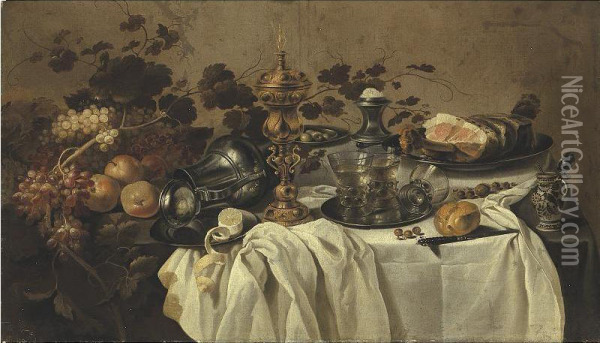 A Gilt Cup And Cover, An Overturned Pewter Jug, Fruit, A Ham On A Pewter Plate, Three Berkmeyer Glasses On A Pewter Plate, A Salt, A Porcelain Mustard Pot, A Knife And A Partly Peeled Lemon On A Partly Draped Table. Oil Painting - Cornelis Cruys