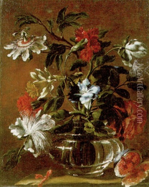 A Still Life Of A Passion Flower, A Daffodil, A Carnation And Other Flowers In A Glass Vase Beside A Split Fig On A Stone Ledge Oil Painting - Mario Nuzzi