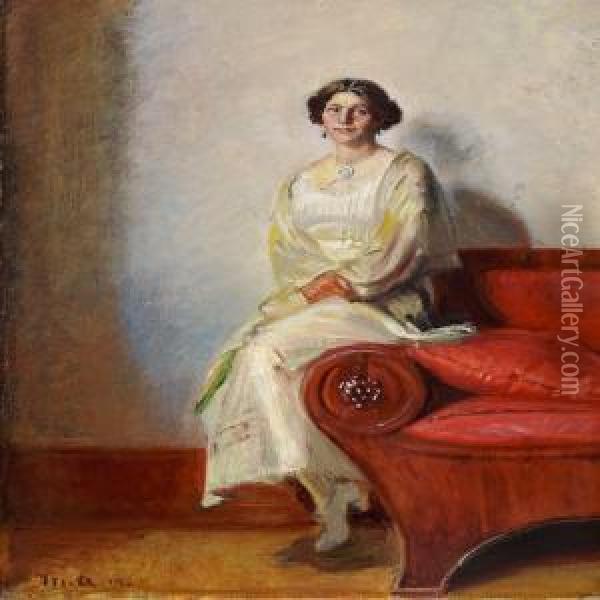 Portrait Of Henny Brodersen Seated On A Sofa Armrest Oil Painting - Michael Ancher